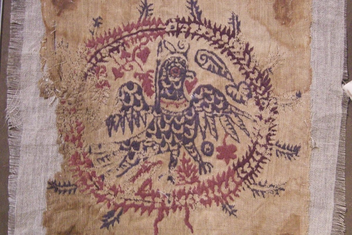 Coptic textile with a bird and plant motif in the Coptic Museum in Cairo